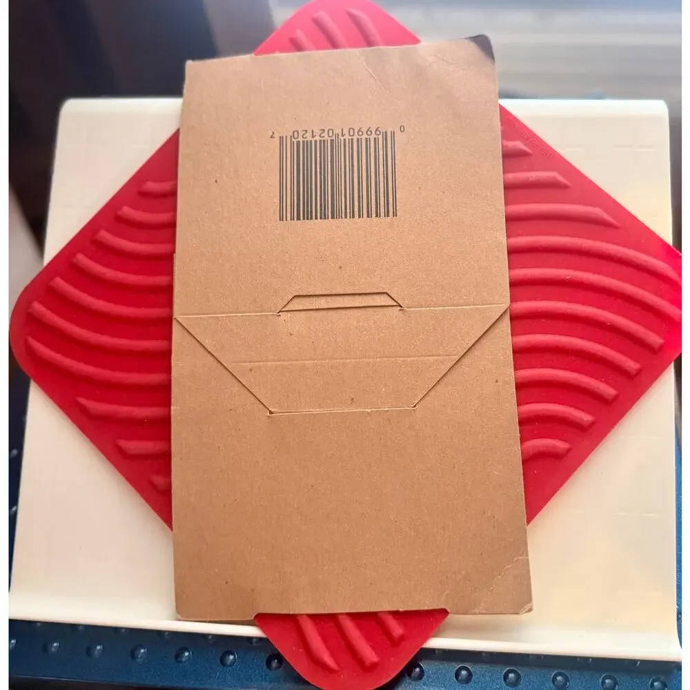 Pampered Chef Hot Pad & Trivet New Condition in the package Cranberry color